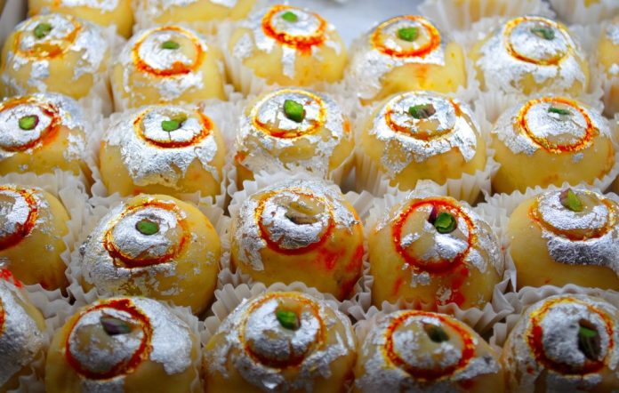 south asian sweets coated with decorative silver foils