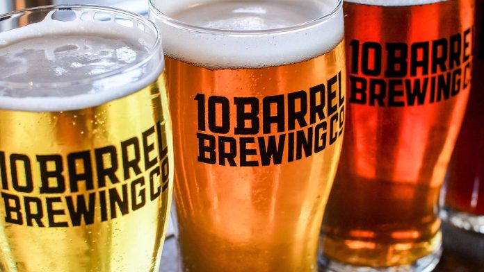 Beer glasses filled with colourful beers