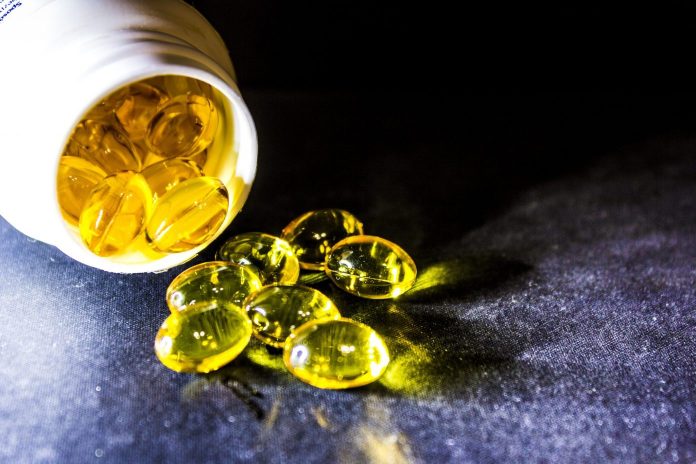omega 3 softgels spilled on table