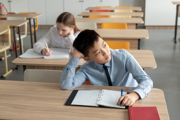 inattentive daydreaming school kid