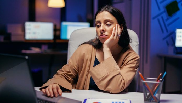 exhausted-businesswoman-looking-computer-working-finish-deadline-smart-woman-sitting-her-workplace-course-late-night-hours-doing-her-job